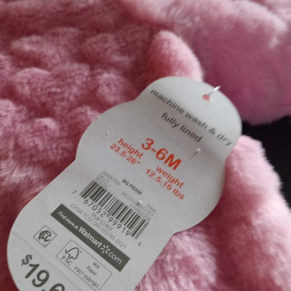 Fuzzy pink suit baby